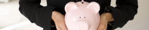 woman-holding-a-pigi-bank