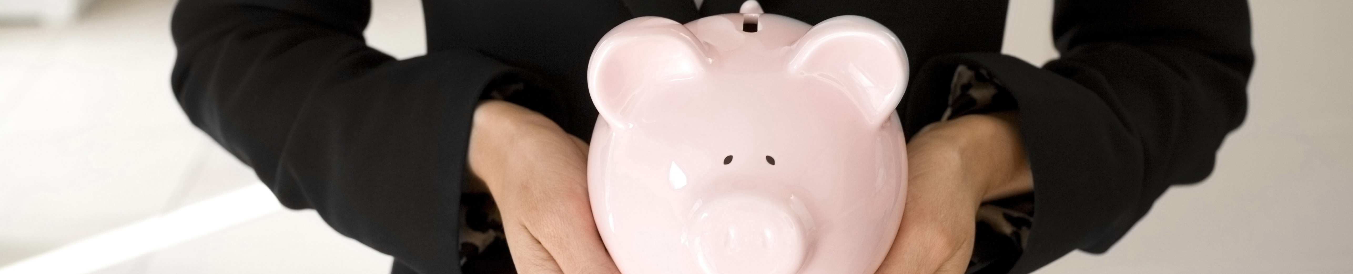 woman-holding-a-pigi-bank