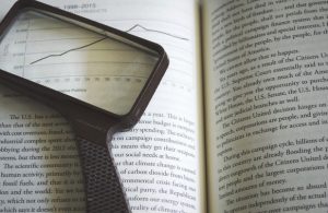 Book and Magnifier