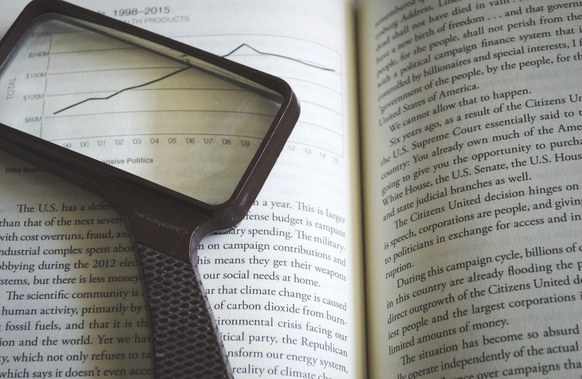 Book and Magnifier
